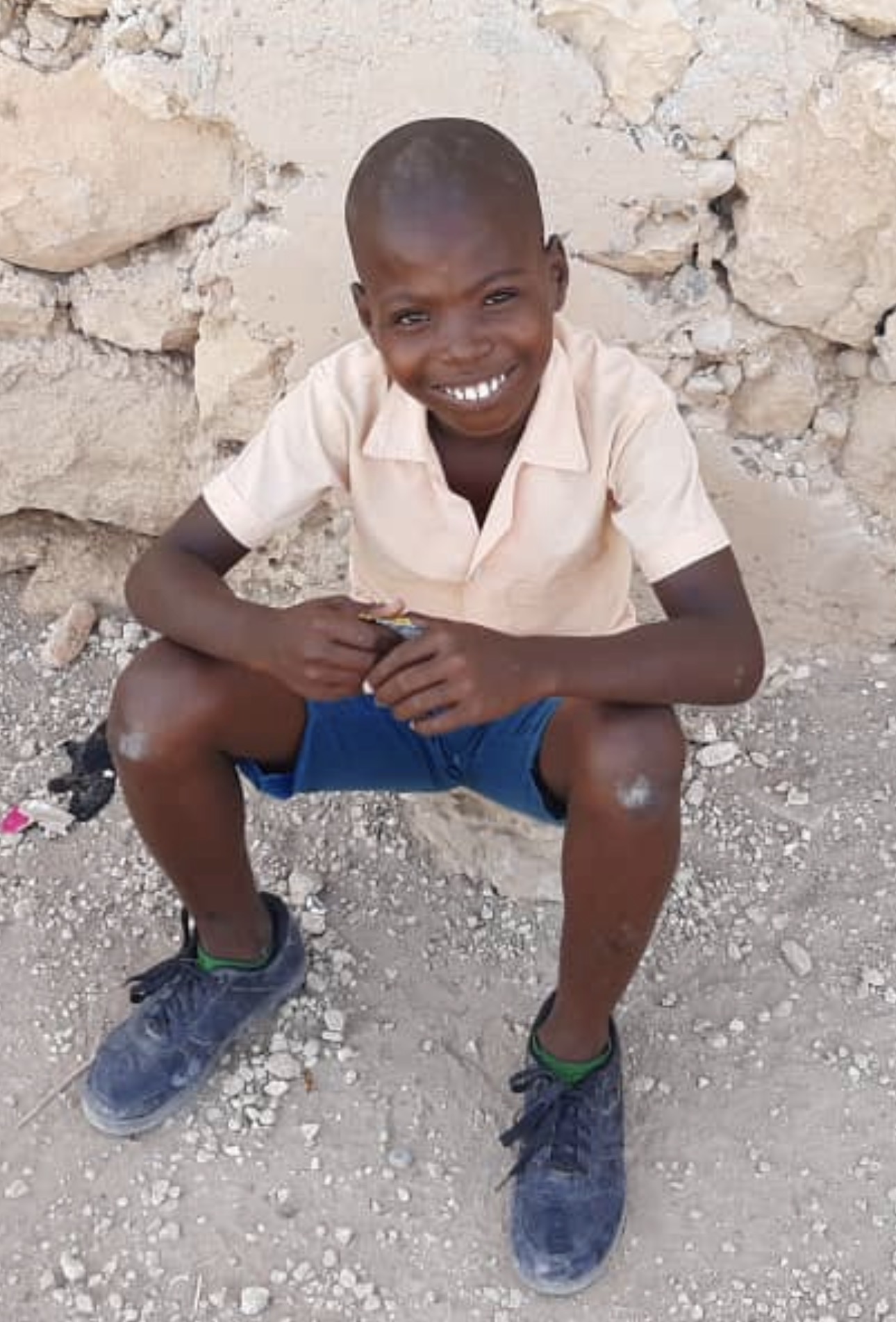Smiling child from Petite Place Cazeau, Haiti